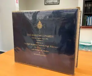 Front cover of photograph album given to Rt. Rev. Wilkinson by Toronto Daily Star