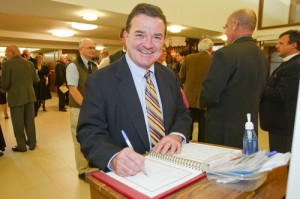 Jim Flaherty takes part in the dedication of the new worship space at St. Thomas Anglican Church in Brooklin, Ont., in 2009. Photo by Michael Hudson
