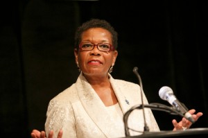 Delores Lawrence, chair of the dinner committee and MC for the evening, welcomes guests.