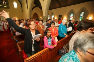 Alumni sing St. Mary's School Hymn during the recessional.