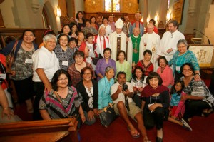 Archbishop Terence Finlay, Bishop Michael Bedford-Jones and Bishop Benjamin Botengan are surrounded by St. Mary's School alumni after the service at St. George, Newcastle. Photos by Michael Hudson