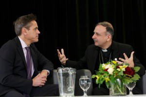 Fr. Nadim Nassar speaks with journalist Mark Kelly
