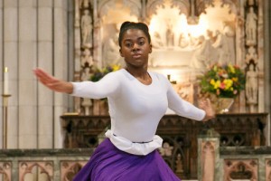Soloist Kimya Hypolite dances at the service.