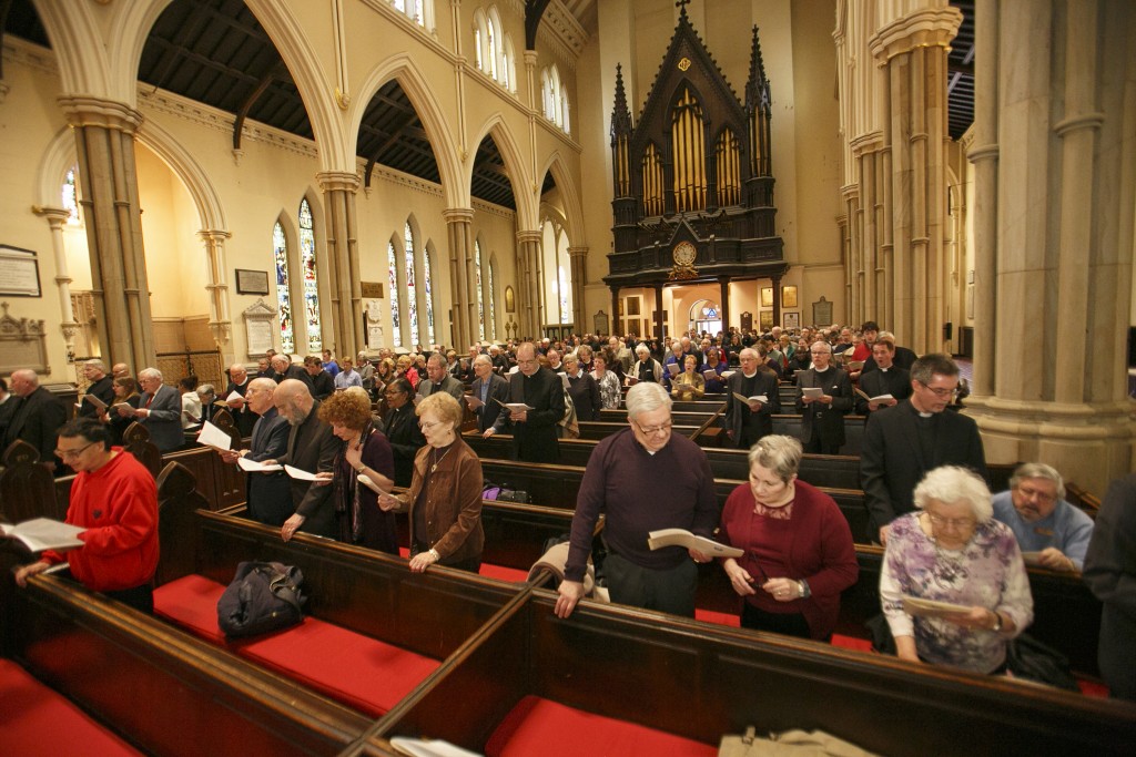 Clergy and other guests join in worship.