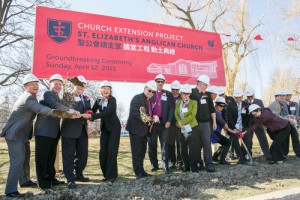 Archbishop Colin Johnson (centre), bishops, clergy, local politicians and members of St. Elizabeth turn the first shovelful of ground for the expansion. 