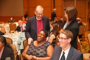 Archbishop Terence Finlay shares a laugh with bursary recipient Allison Dean.