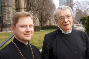The Rev. Fr. Geoffrey Ready (left) and the Rev. Canon David Neelands outside Trinity College, Toronto. Photo by Michael Hudson