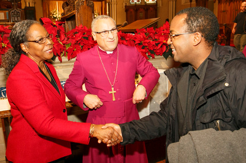 Bishop Peter and Angela Fenty greet a guest. 
