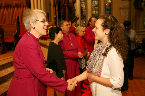 Bishop Linda Nicholls greets a guest. 