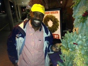 Desley White with some of the cedar and pine wreaths he donated for refugee sponsorship. Photo courtesy of St. John, Bowmanville