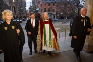 Dean Asbil escorts Mayor John Toronto into the cathedral at the start of the service, accompanied by churchwardens Angela Carroll and Larry Enfield. Photo by Michael Hudson
