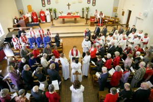 A full church listens to the reading of the Gospel at the service on Feb. 28.