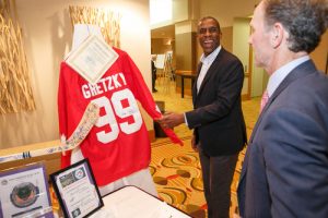 Guests examine the silent auction prizes.