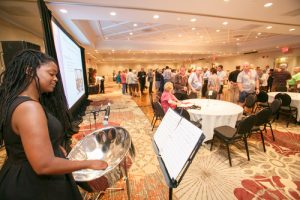Joy Lapps plays steel pan at the opening reception of 41st General Synod of the Anglican Church of Canada at the Sheraton Parkway North Hotel, Richmond Hill, Ont. on July 7, 2016. Photos by Michael Hudson