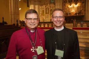 Archbishop Colin Johnson stands beside Bishop-elect Kevin Robertson