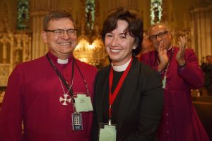 Archbishop Colin Johnson stands next to Bishop-elect Jenny Andison.