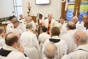 Bishop Andrew Asbil presides at the ordination of the Rev. Morning Wang at St. George on Yonge.